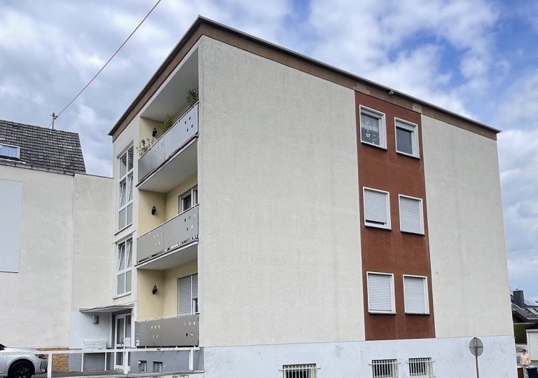 Seitenansicht Bad H�nningen Mehrfamilienhaus *Kompakt. Zentral* 6 auf einen Streich - Apartmenthaus mit Potenzial! 20.640 Euro Kaltmiete i. Jahr