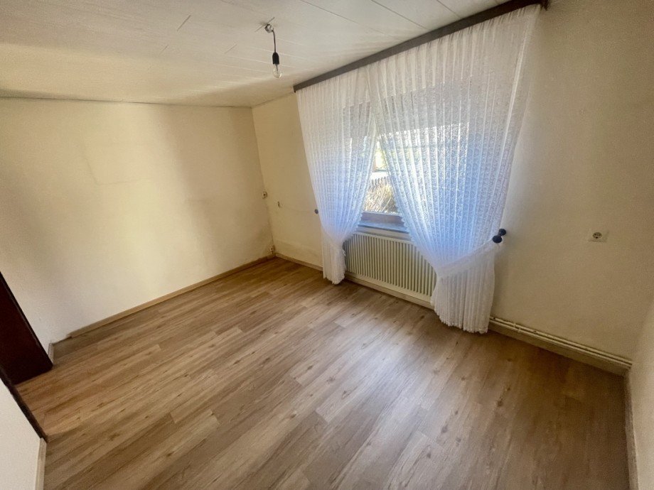 Wohnen 2: Zimmer Zweifamilienhaus Harschbach